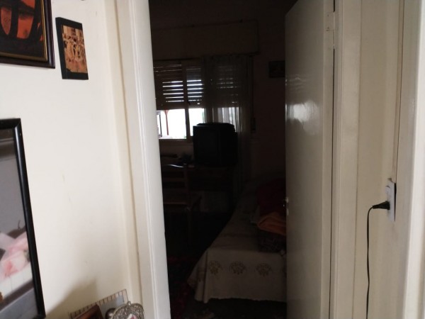 Casa en Villa Tesei con gran galpón al fondo